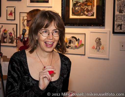 Sherri Schultz, independent editor and founder of the Northwest Independent Editors Guild, celebrates her raffle win.