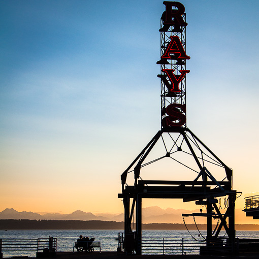 Ray's Boathouse sign with Puget Sound and the Olympics in the background